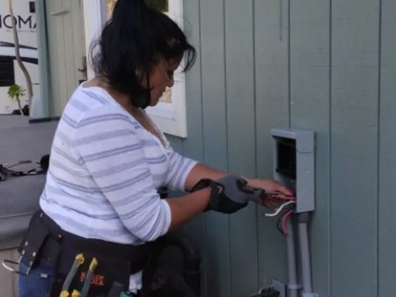Licensed electrician wiring an exterior subpanel in Bethlehem